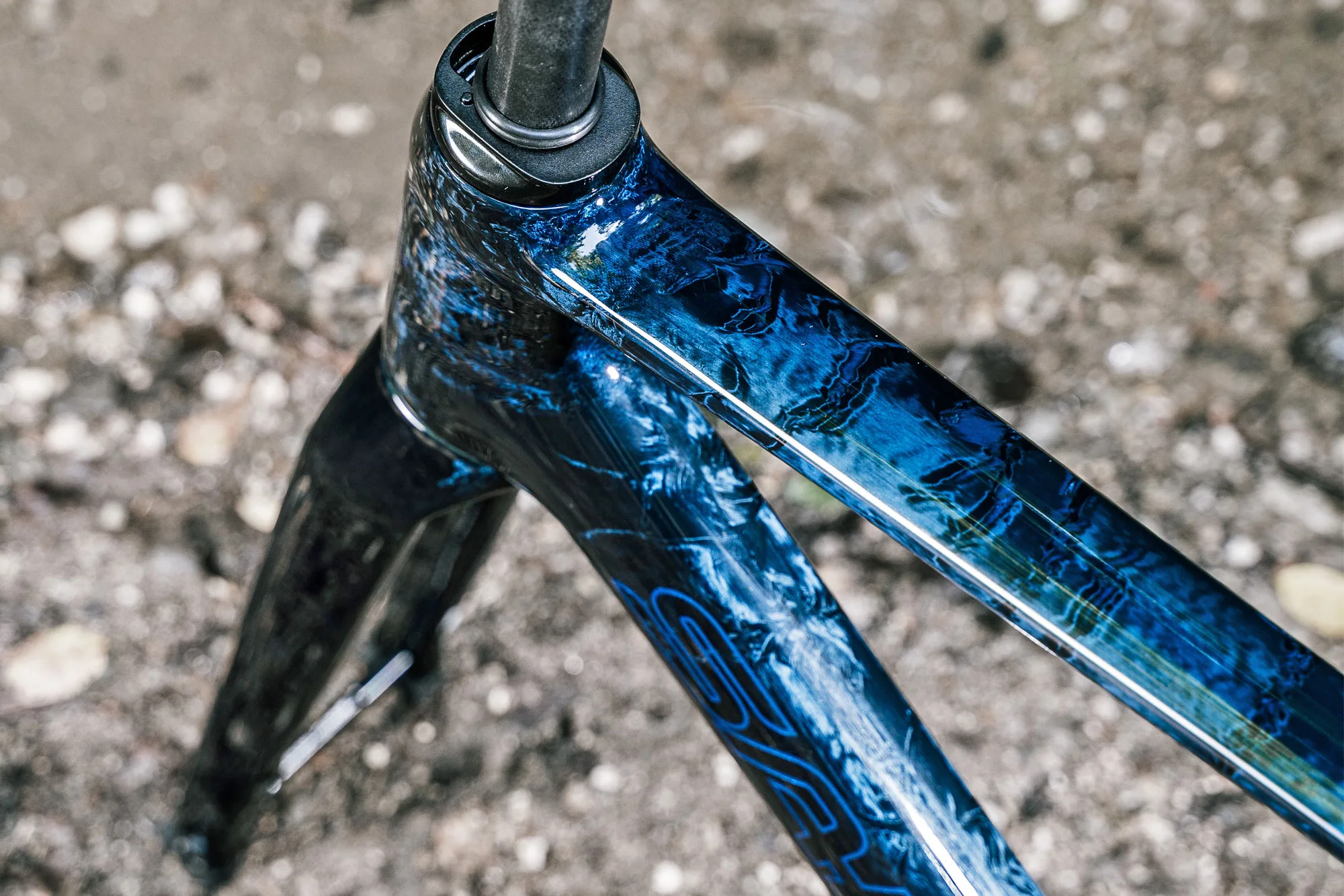 Sarto Marble bespoke UD carbon finish boosts strength style, blue marble carbon detail